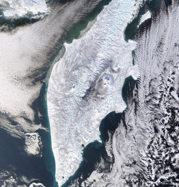 Камчатка в снегу. Вид с орбиты Земли.